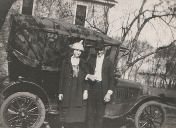 Arthur and Maggie Tolstrup next to a Model T Ford